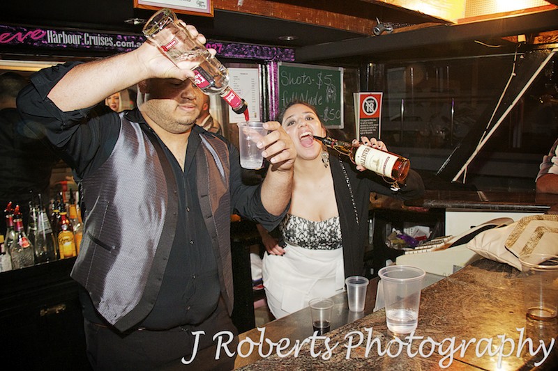 Drinks flowing on sydney harbour cruise - Party Photography Sydney